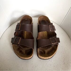 ། ” ் ʖ̯ ் ” །
Birkenstock Arizona Dark Brown Sandals